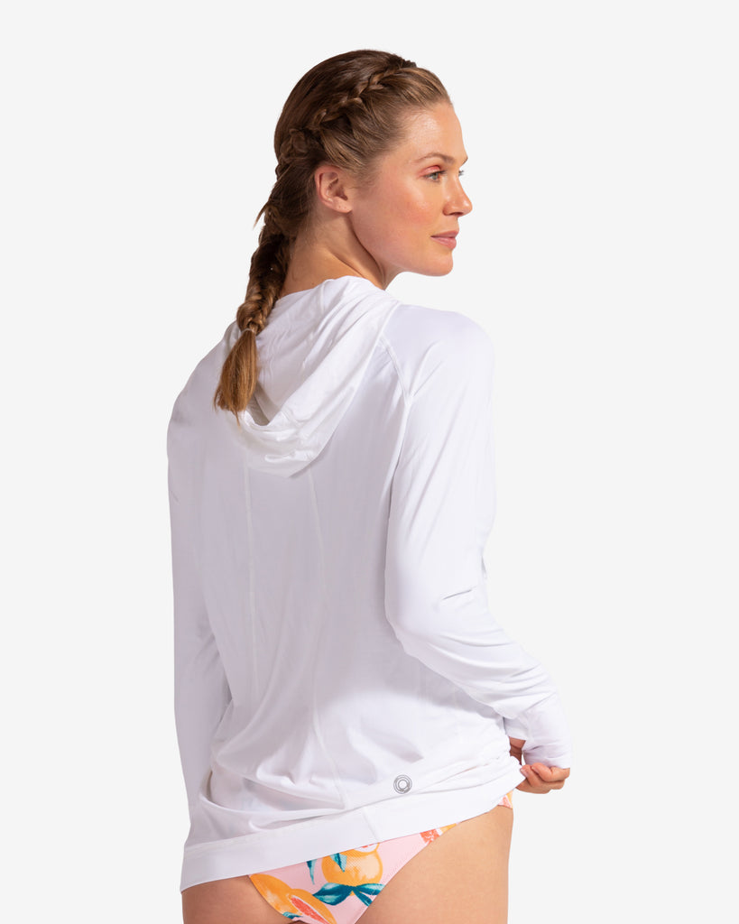 Women wearing white unisex long sleeve hoodie shirt. (Style 12007) - BloqUV