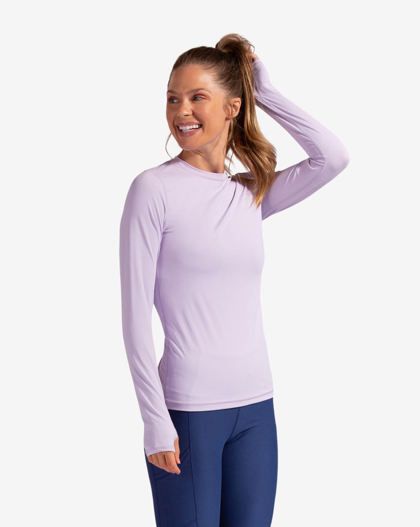 Women wearing lavendar long sleeve 24/7 shirt with navy tights. (Style 2001) - BloqUV
