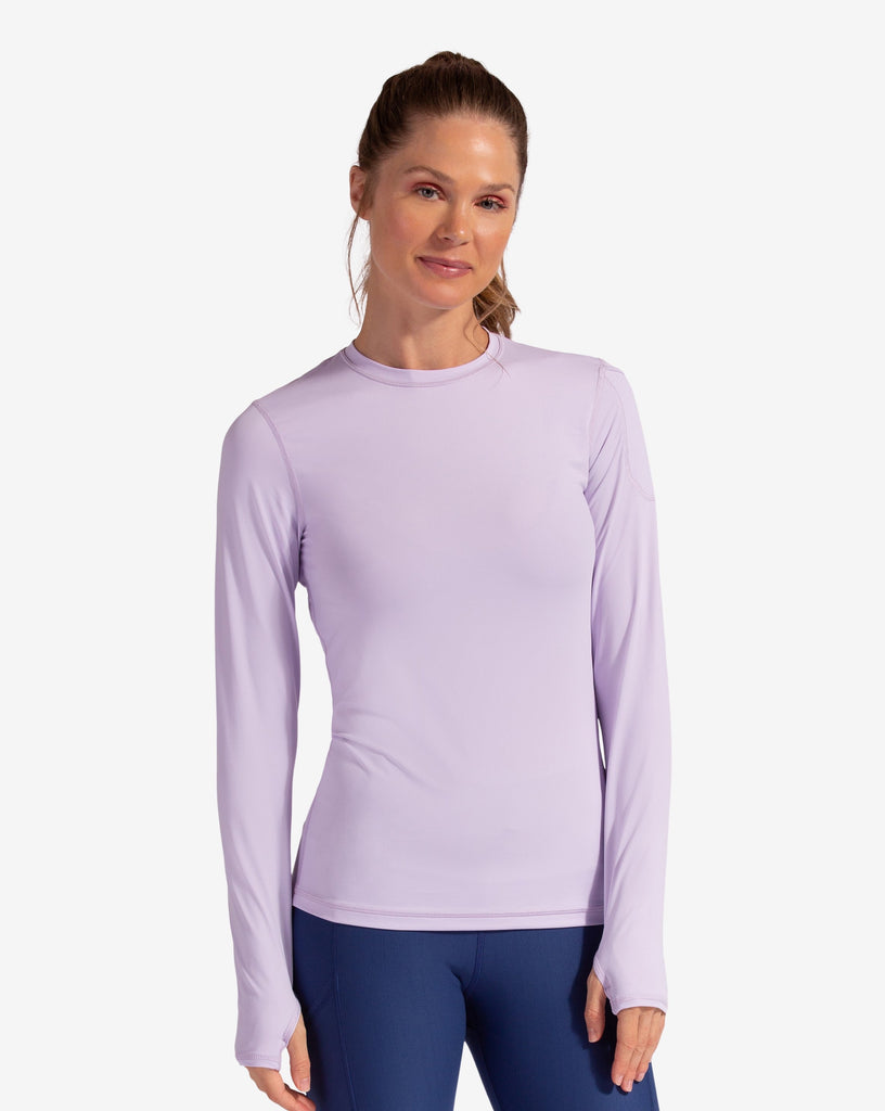 Women wearing lavender long sleeve 24/7 shirt with navy tights. (Style 2001) - BloqUV