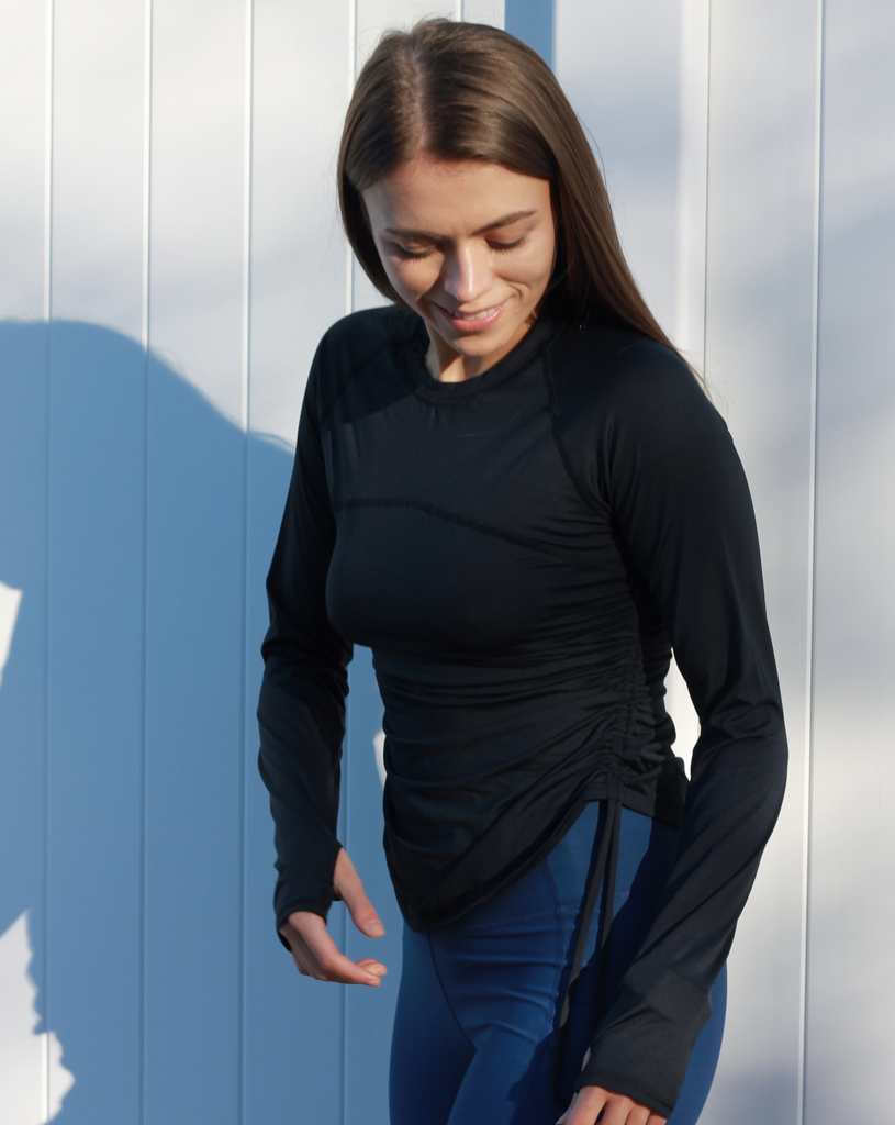 Women wearing black long sleeve drawstring crew with navy tights. (Style 2006) - BloqUV