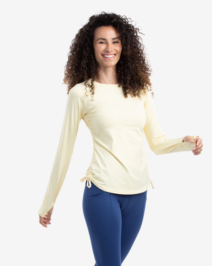 Women wearing lemon yellow long sleeve drawstring crew with navy tights.  (Style 2006) - BloqUV