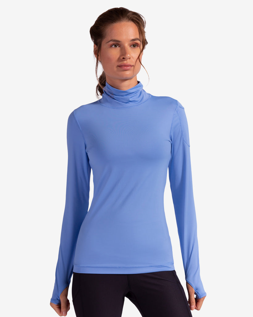 Women wearing indigo turtle neck top with black tights. (Style 2013) - BloqUV