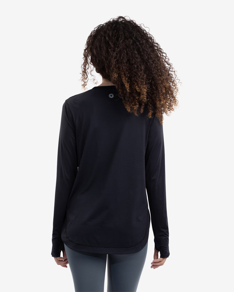 Women wearing black relaxed scallop top with smoke tights. Picture shows back of shirt. (Style 2015) - BloqUV
