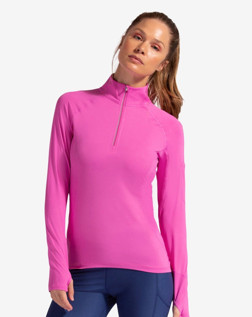 Women wearing bubble gum mock zip long sleeve top with navy tights. (Style 3001) - BloqUV