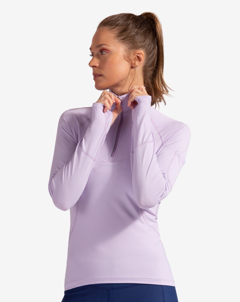 Women wearing lavender mock zip long sleeve top with navy tights.  (Style 3001) - BloqUV