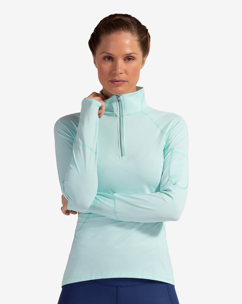 Women wearing mint mock zip long sleeve top with navy tights. (Style 3001) - BloqUV