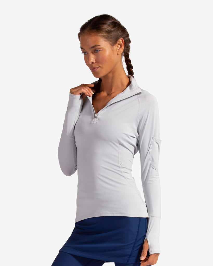 Women wearing soft grey mock zip long sleeve top with navy tights. (Style 3001) - BloqUV