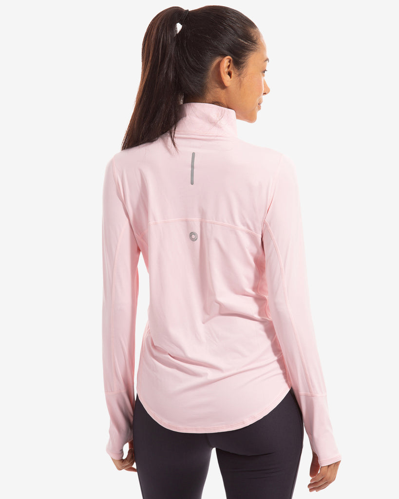 Women wearing tickle me pink relaxed mock zip top. Picture shows back of shirt. (Style 3002) - BloqUV