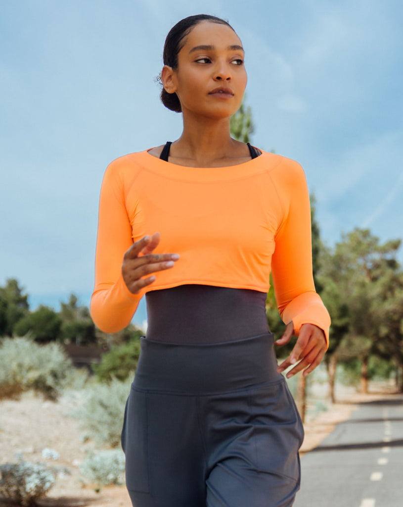 Women wearing tangerine crop top and grey tank underneath. (Style 3002) - BloqUV