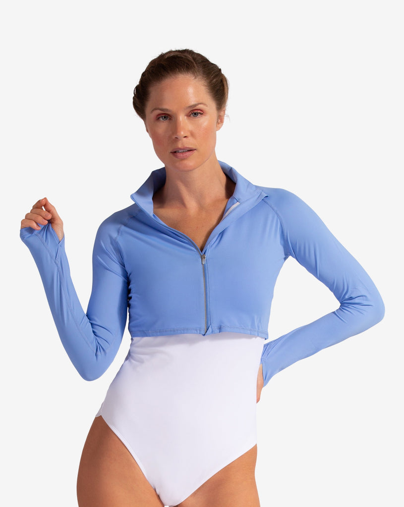 Women wearing indigo full zip crop top over white swimsuit. (Style 4010) - BloqUV