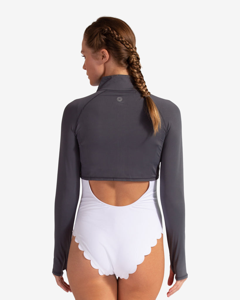 Women wearing smoke full zip crop top with one piece swimsuit. Picture shows the back.(Style 4010) - BloqUV