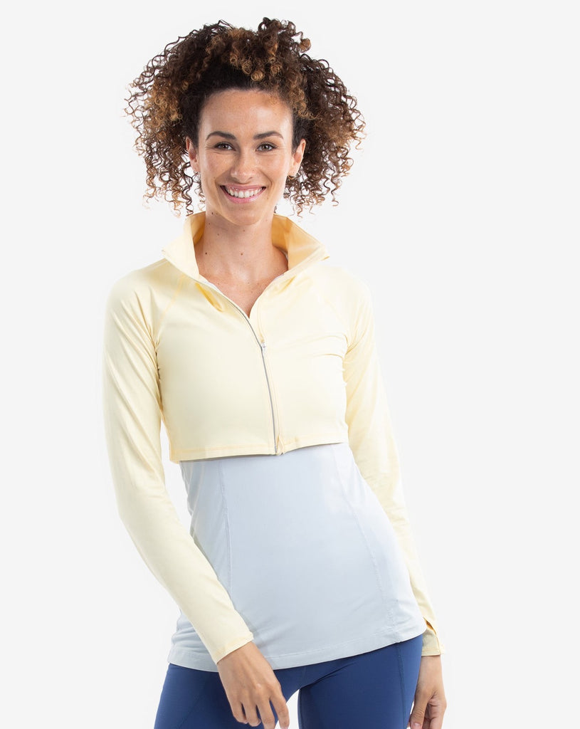 Women wearing lemon yellow full zip crop top over tank top with leggings. (Style 4010) - BloqUV