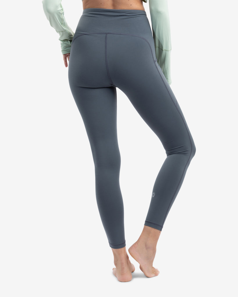 Women wearing compression capri leggings in smoke. Pictures shoes back of leggings.(Style 6107) -BloqUV