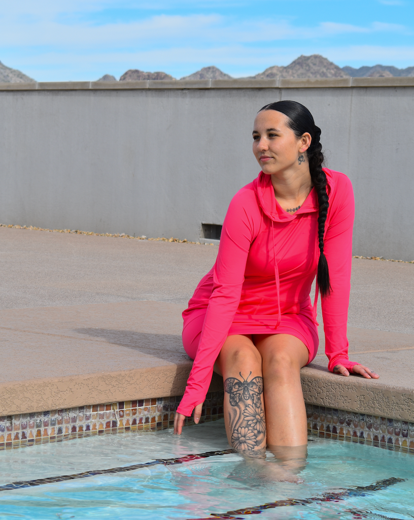 Women sitting by the pool wearing watermelon hoodie dress. (Style 2009) - BloqUV